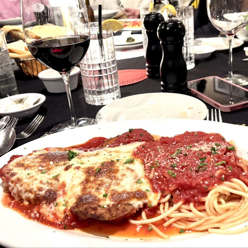 Umberto's Italian Restaurant signature dishes The fixed-price menu includes a choice of entrees like:Veal ParmesanChicken CacciatoreShrimp Scampi